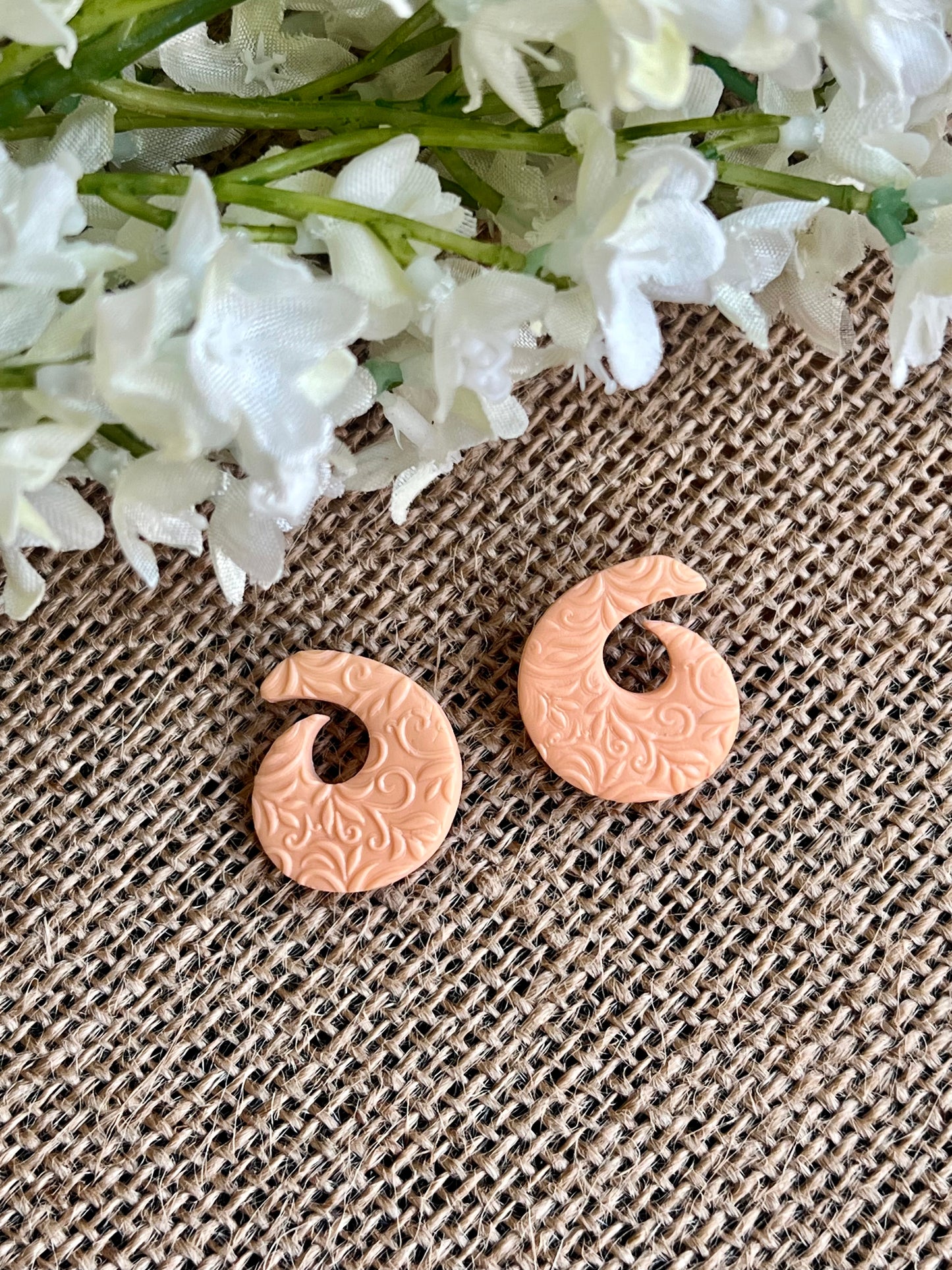 Textured Spiral Shape Studs in Peach Color