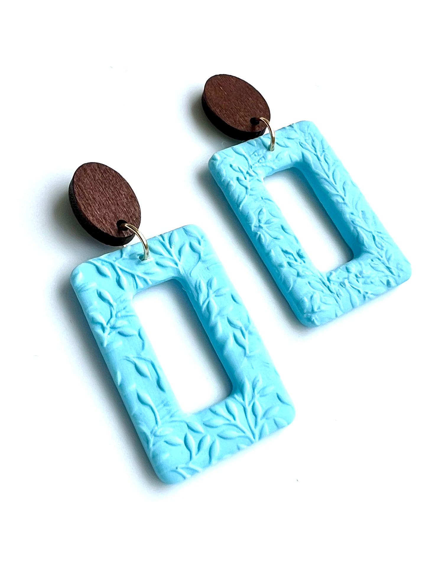 Dangles with Floral Relief in Baby Blue