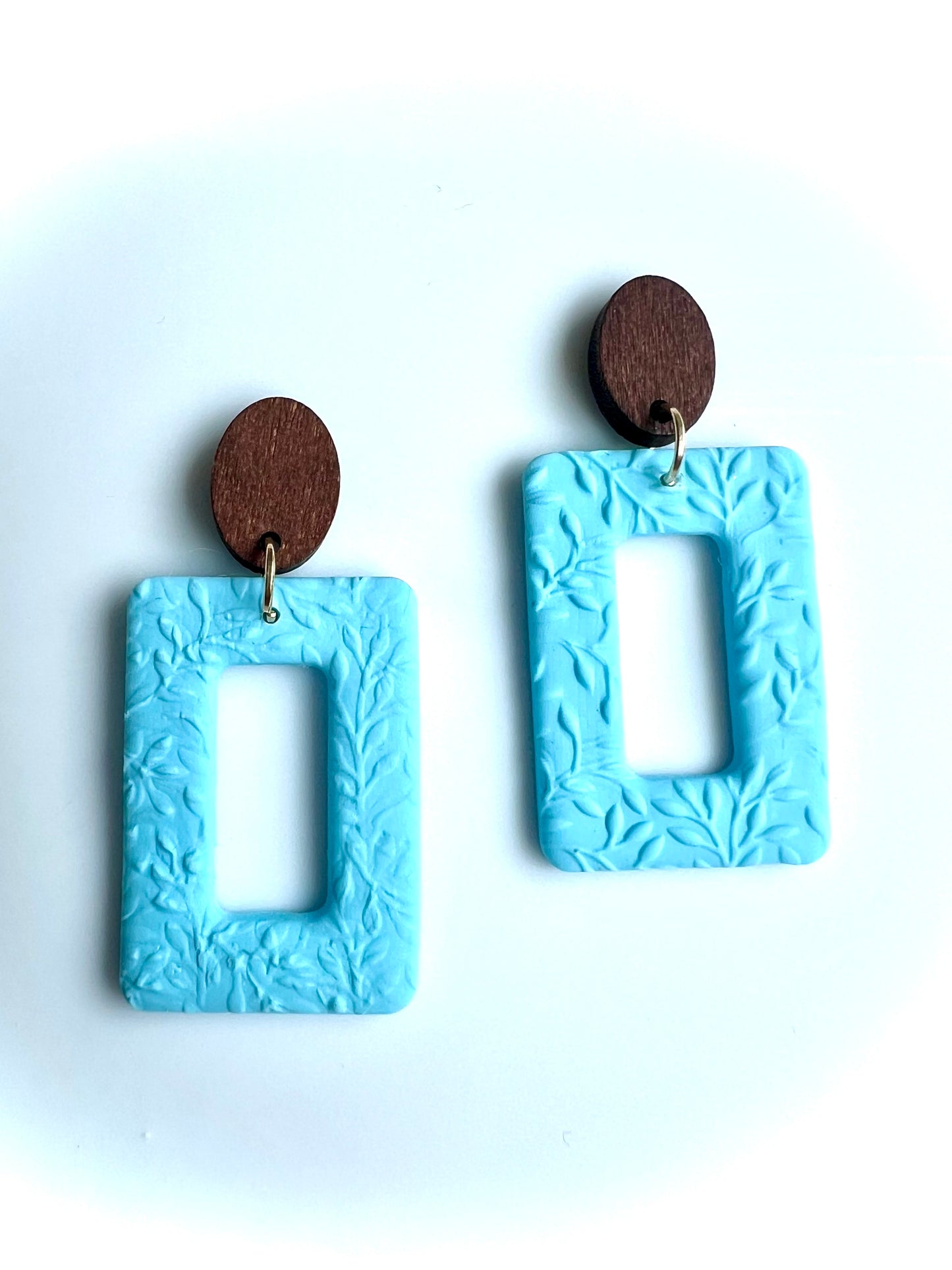 Dangles with Floral Relief in Baby Blue