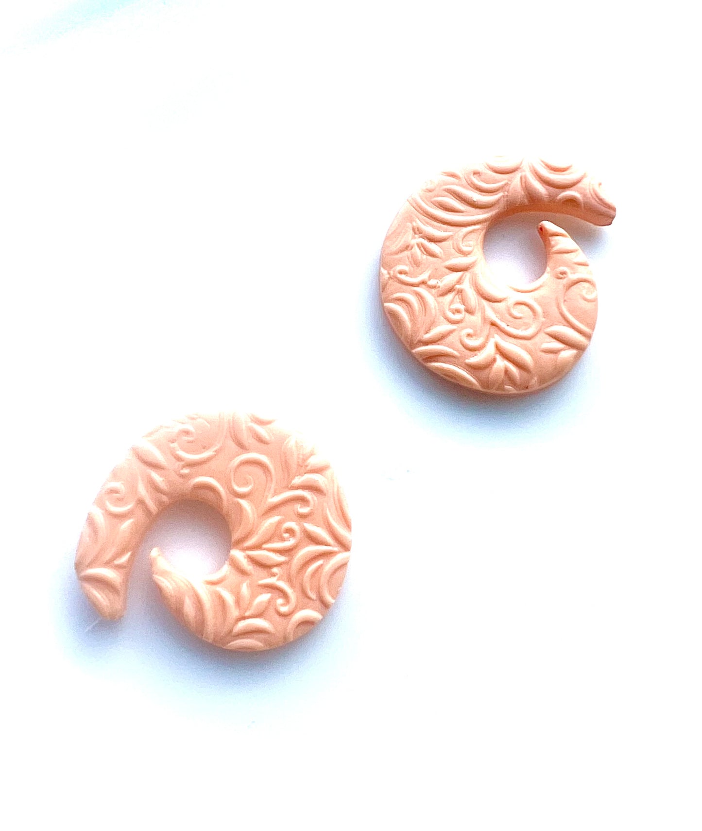 Textured Spiral Shape Studs in Peach Color