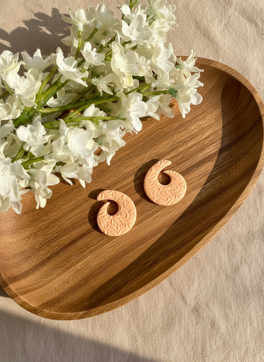 Textured Spiral Shape Studs in Peach Color