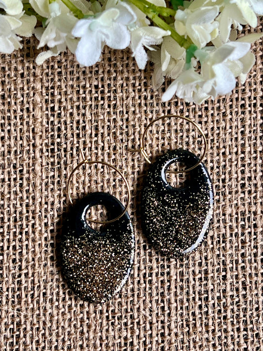 Black Hoop Earrings with a Touch of Gold Glitter