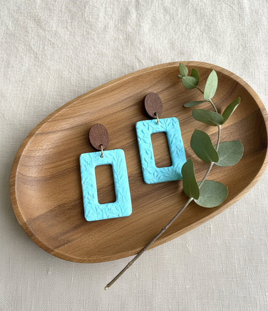 Dangles with Floral Relief in Baby Blue