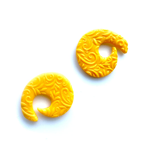 Textured Spiral Shape Studs in Yellow Color